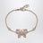 Bracelet Flutterby doré en métal et cristaux