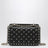 Borsa a mano mini Rockstud Spike in pelle nera
