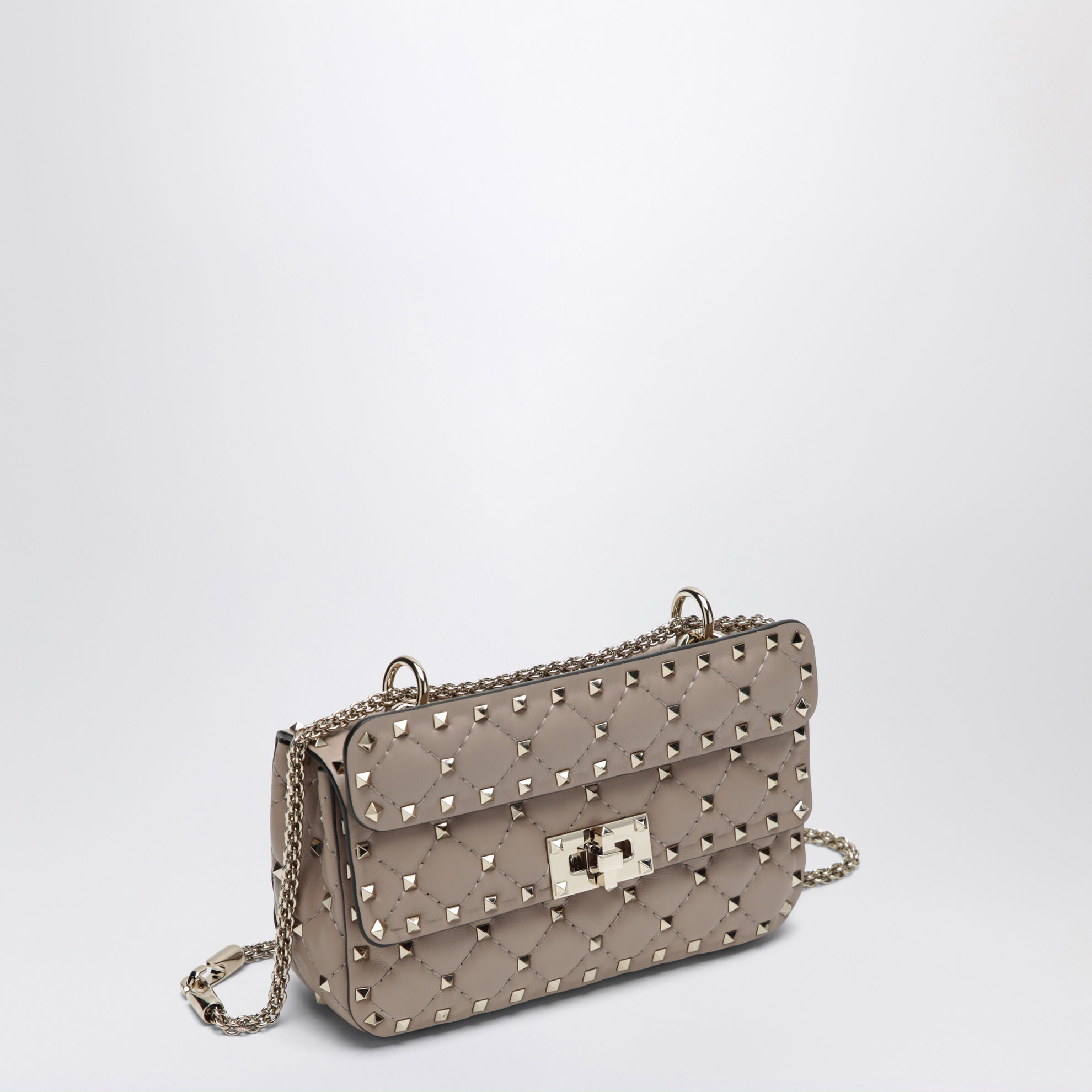 Mini Rockstud Spike top-handle bag in powder pink leather