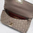 Mini Rockstud Spike top-handle bag in powder pink leather