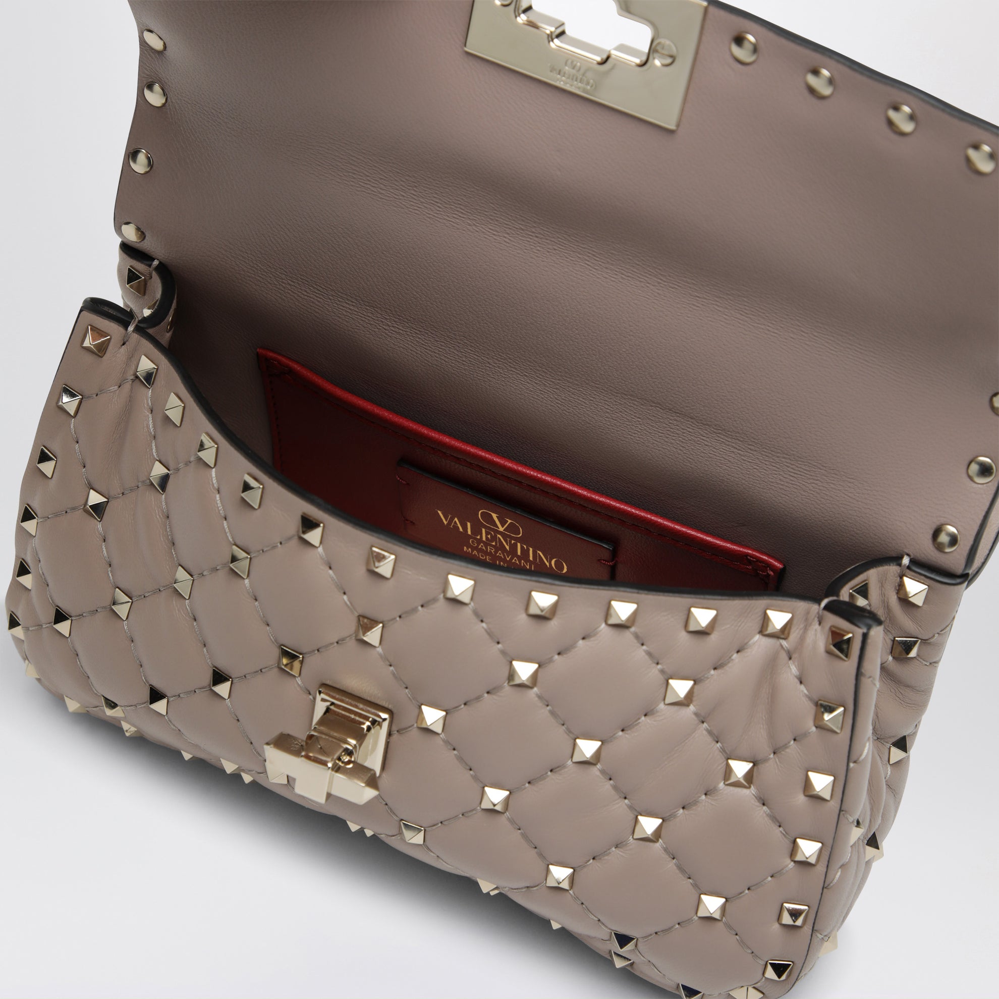 Mini Rockstud Spike top-handle bag in powder pink leather