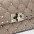 Mini Rockstud Spike top-handle bag in powder pink leather