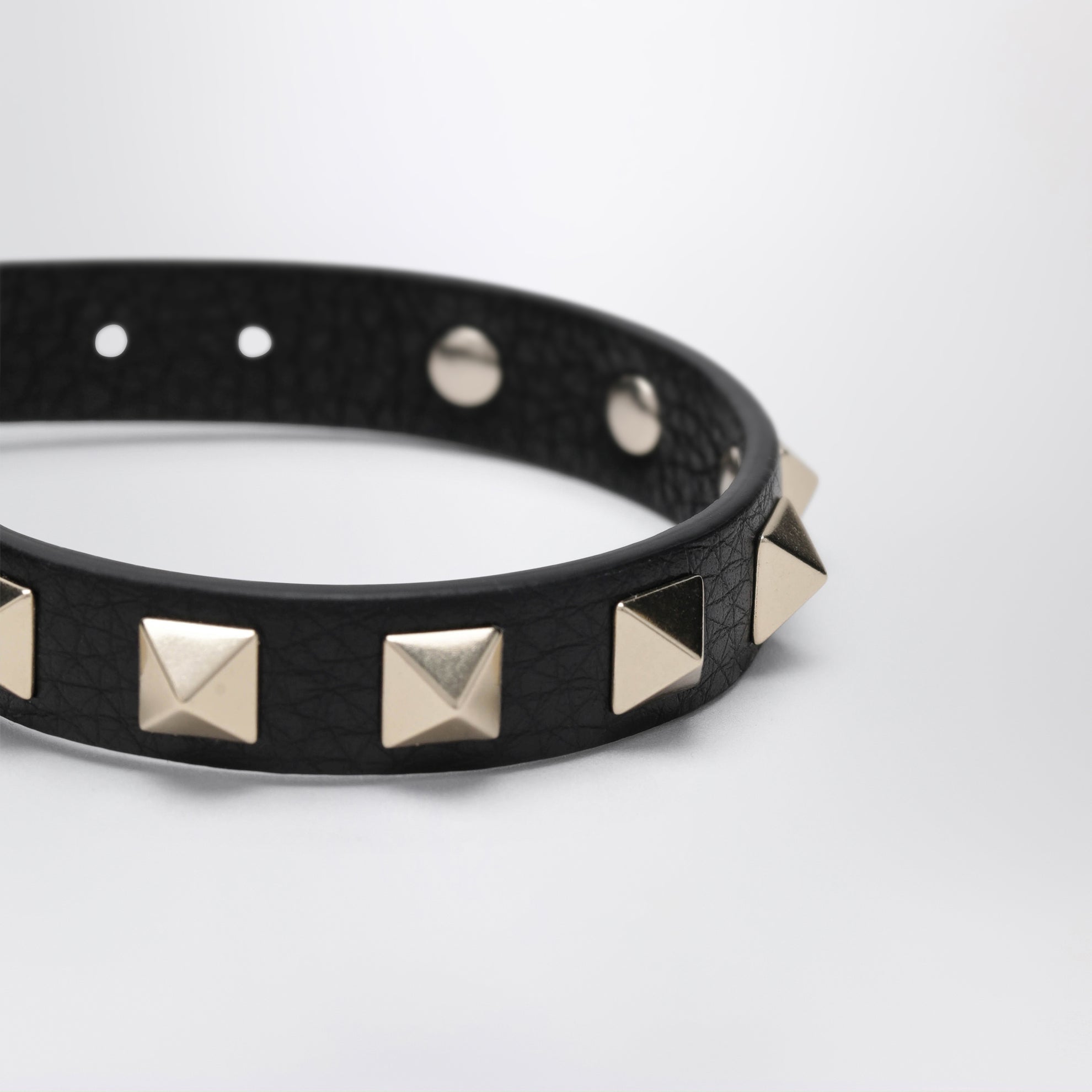 Black leather Rockstud bracelet with gold-tone studs