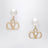Boucles d’oreilles VLogo Signature avec perle dorées