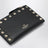 Porte-cartes zippé Rockstud en cuir noir