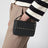 Pouch Rockstud in pelle di vitello granata nero