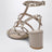 Rockstud sandals with blush-colored straps