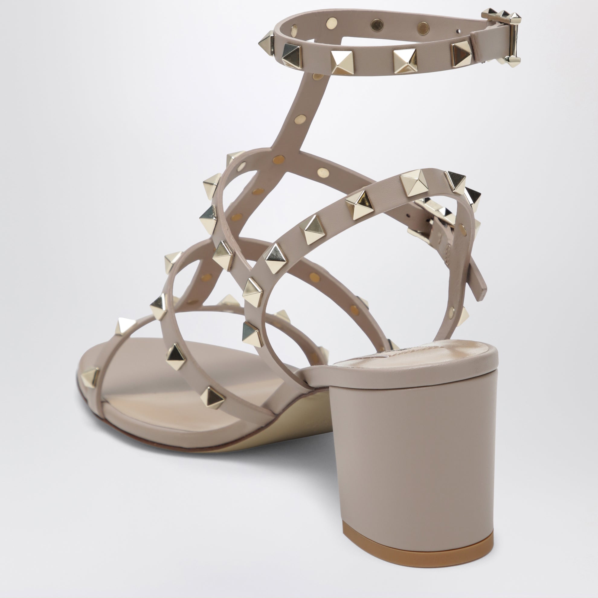 Rockstud sandals with blush-colored straps