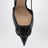 Scarpe slingback nere in pelle verniciata