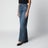 Washed blue jeans with curved front seams