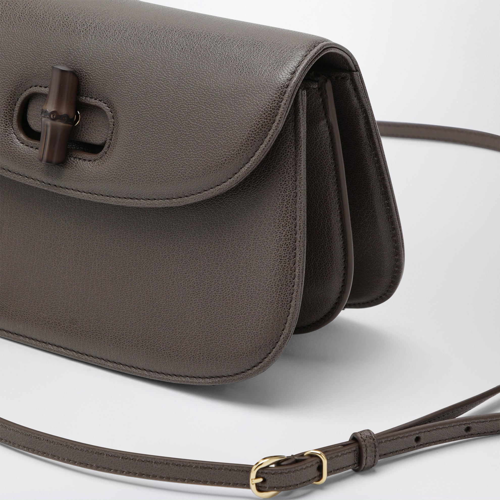 Small shoulder bag in dark taupe leather with bamboo closure