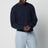 Nachtblauer Pullover mit Intrecciato-Ellenbogenpatches