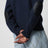 Nachtblauer Pullover mit Intrecciato-Ellenbogenpatches