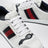 Sneaker Screener in pelle traforata bianca/blu