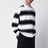 Polo a righe bianche/nere in cotone