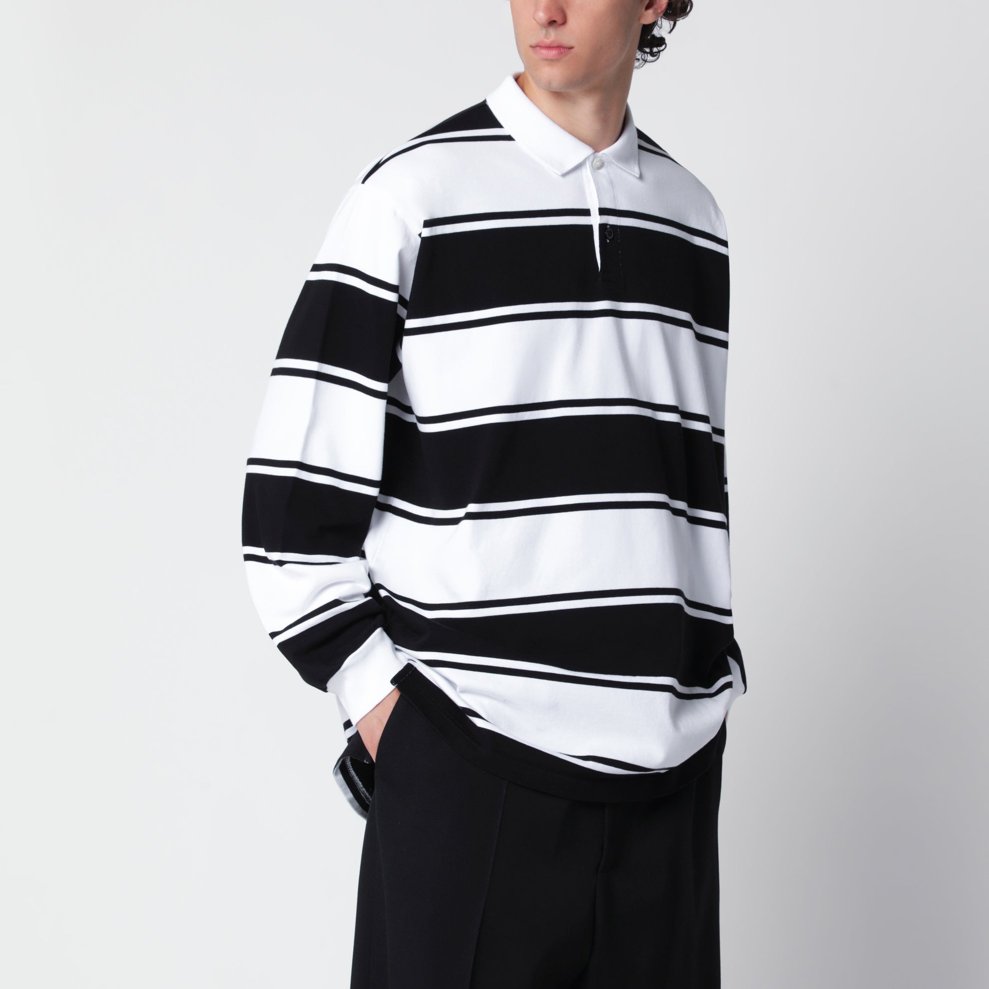 Polo a righe bianche/nere in cotone