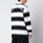 Polo a righe bianche/nere in cotone
