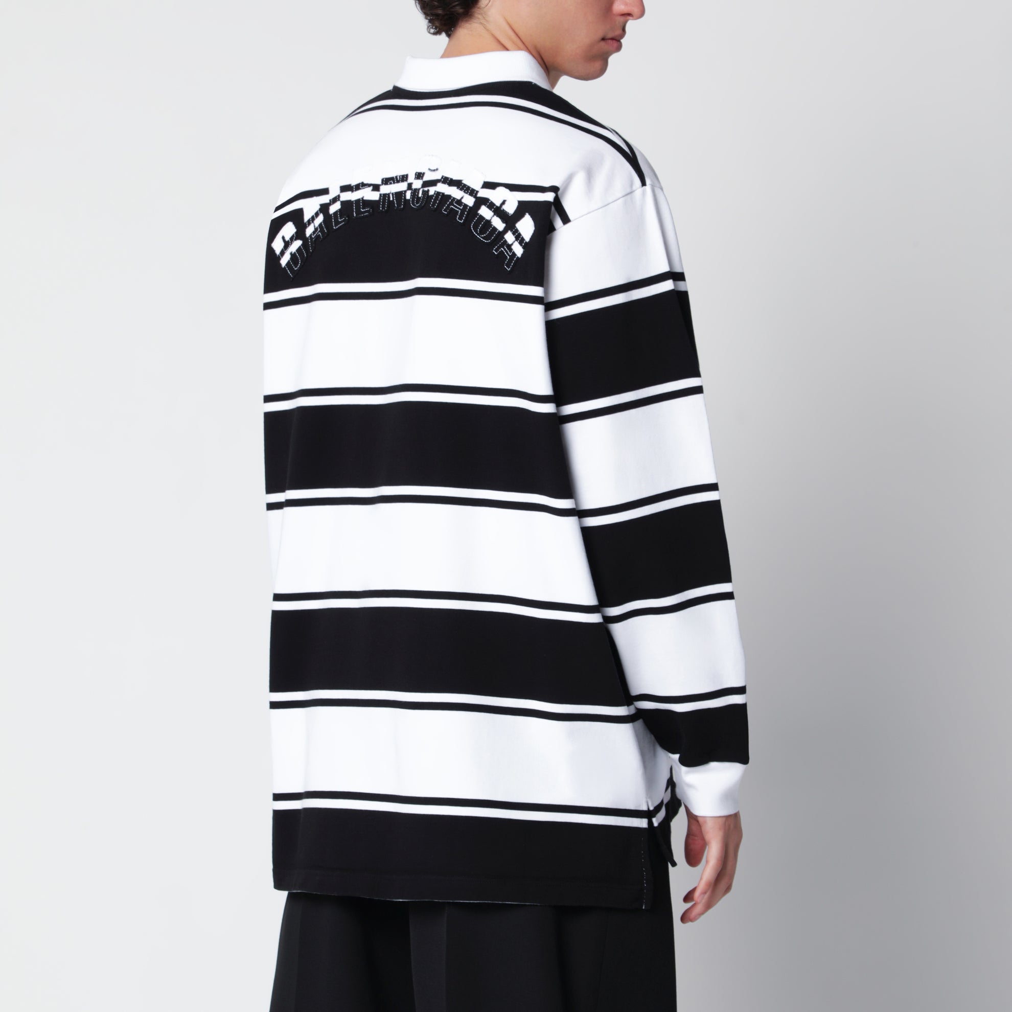 Polo a righe bianche/nere in cotone