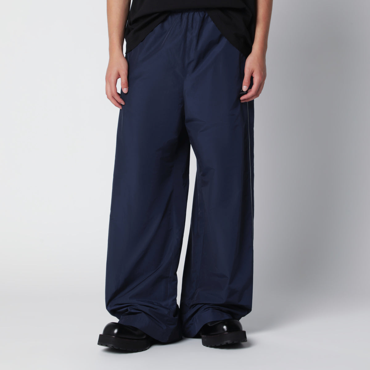 Balenciaga Bodies track pants in dark navy poplin | TheDoubleF
