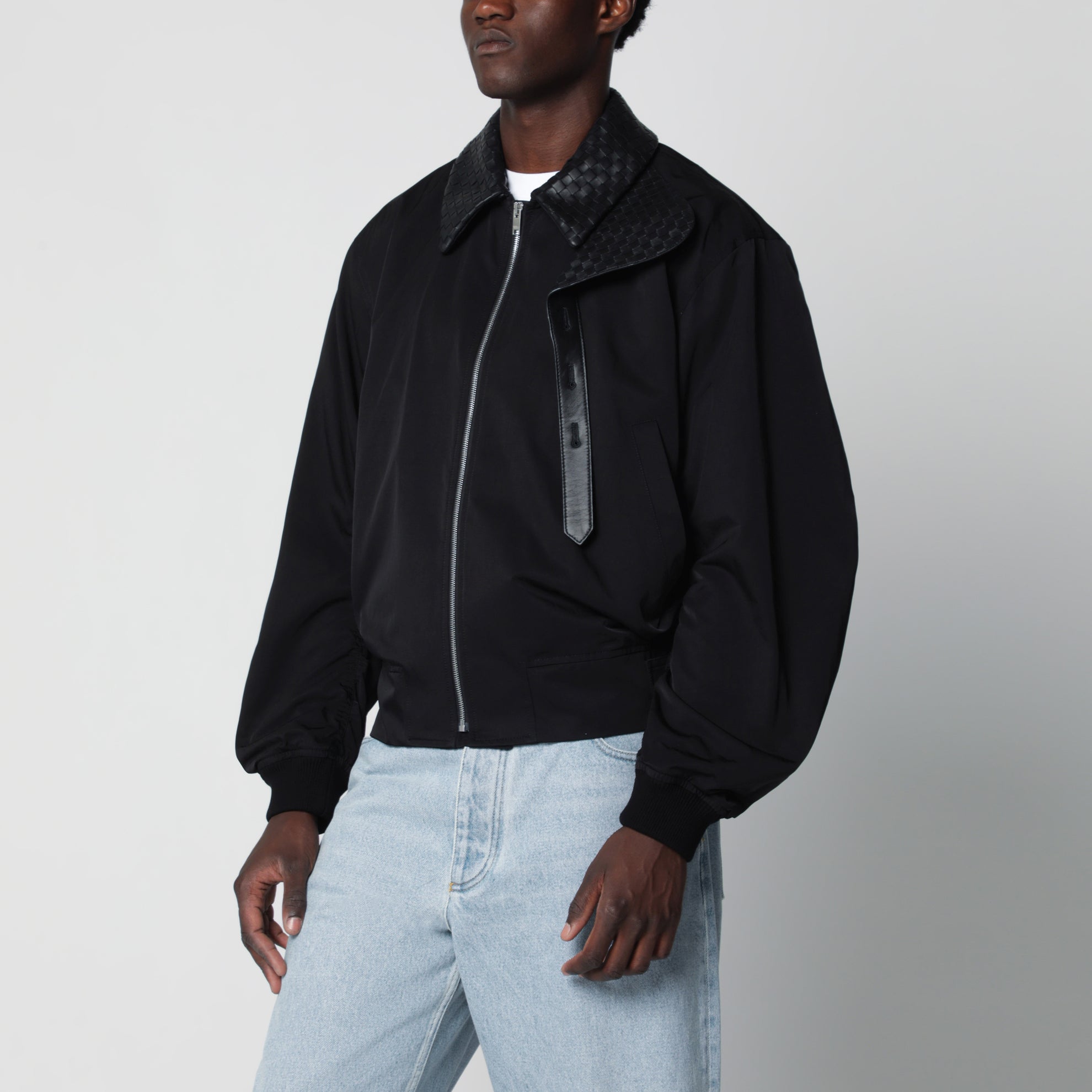 Black zip-up jacket with Intrecciato collar
