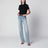 Black cropped cotton piqué polo shirt