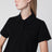 Polo cropped nera in piquet di cotone