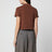 Polo cropped color caramello in piquet di cotone