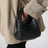Schwarze Baby Bell Schultertasche aus Leder
