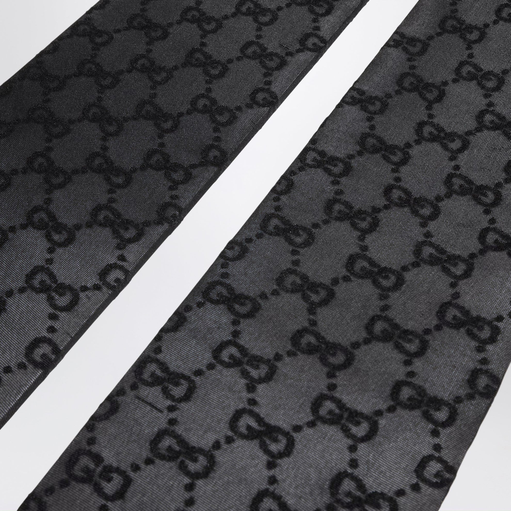 Schwarze Strumpfhose aus elastischem Nylon mit GG-Muster