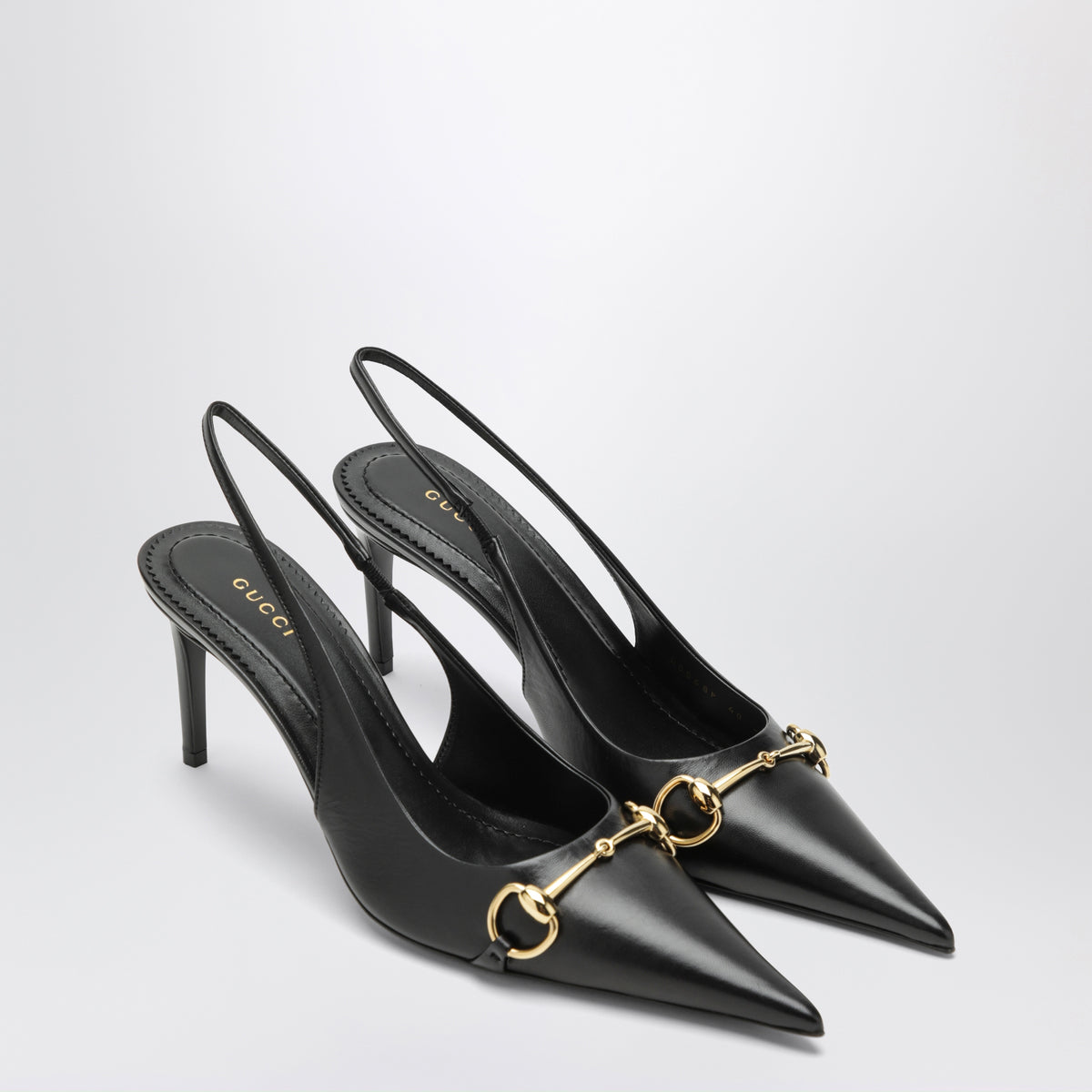 Black leather slingback pumps