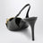 Black leather slingback pumps