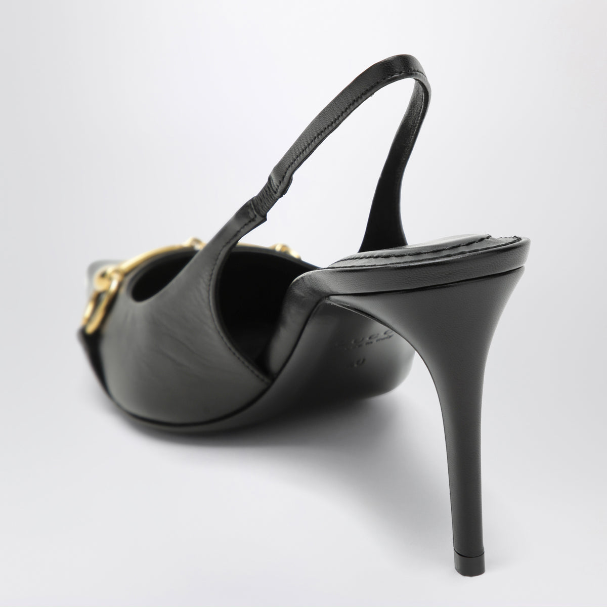 Black leather slingback pumps