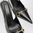 Black leather slingback pumps