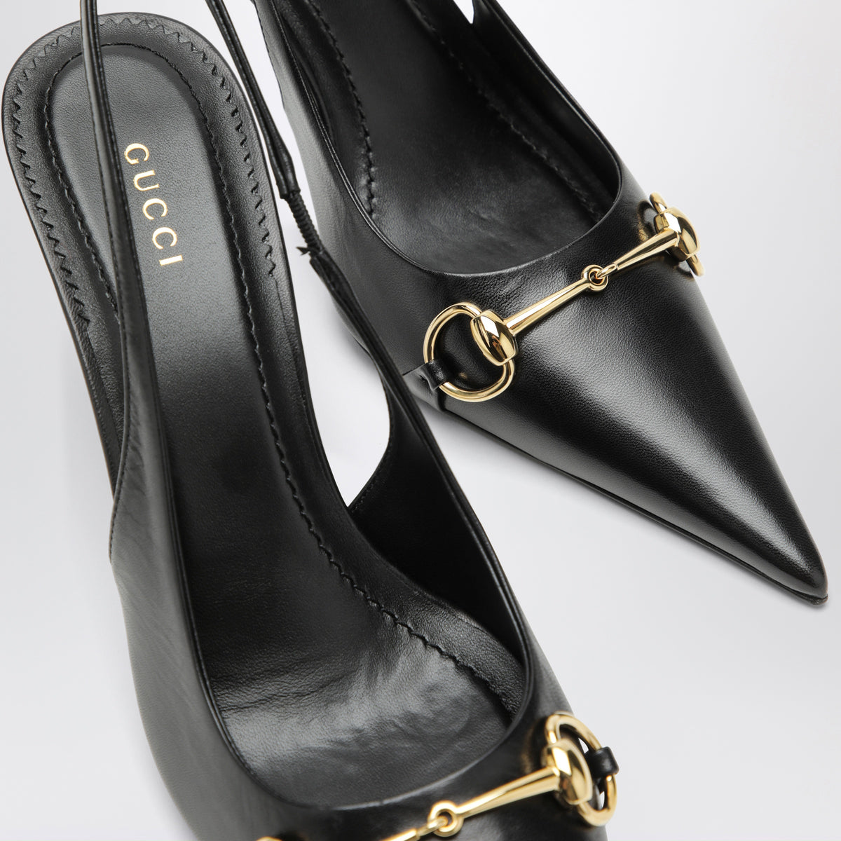 Black leather slingback pumps