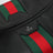 Schwarze Tasche aus genarbtem Leder mit Web-Detail