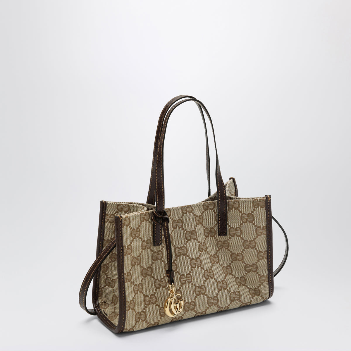 Borsa shopping piccola con ciondolo Doppia G
