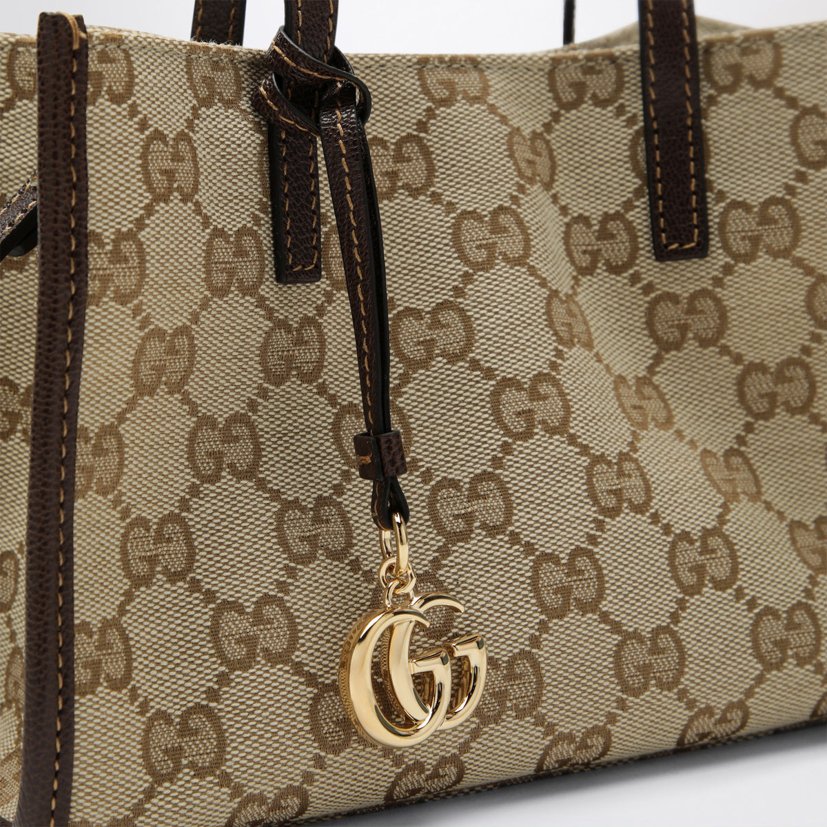 Borsa shopping piccola con ciondolo Doppia G