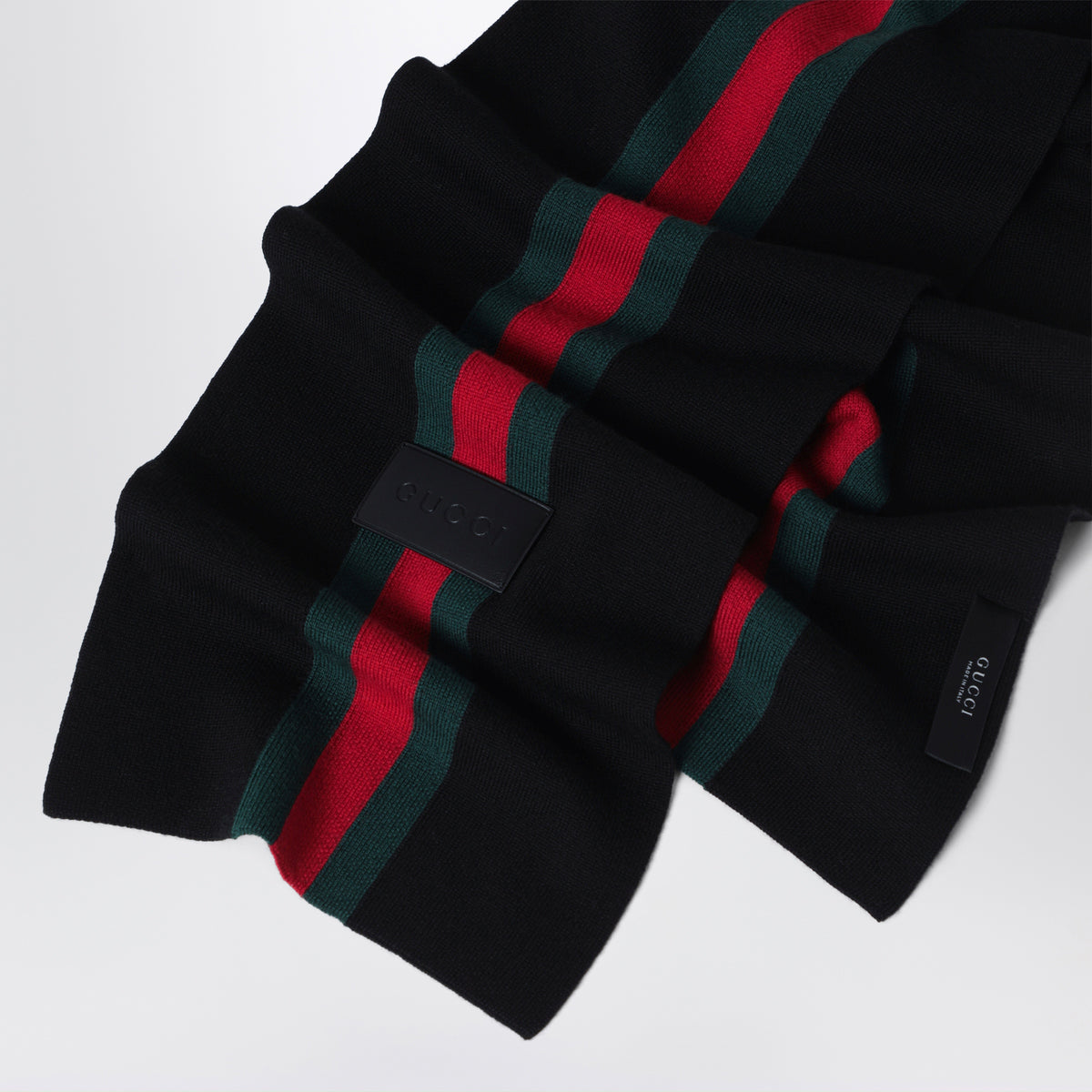 Écharpe rayée noire et verte en laine jacquard