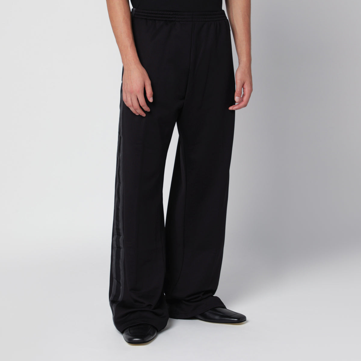 Pantalone jogging nero e grigio in tessuto tecnico