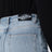 Pantalone in denim delavé schiarito