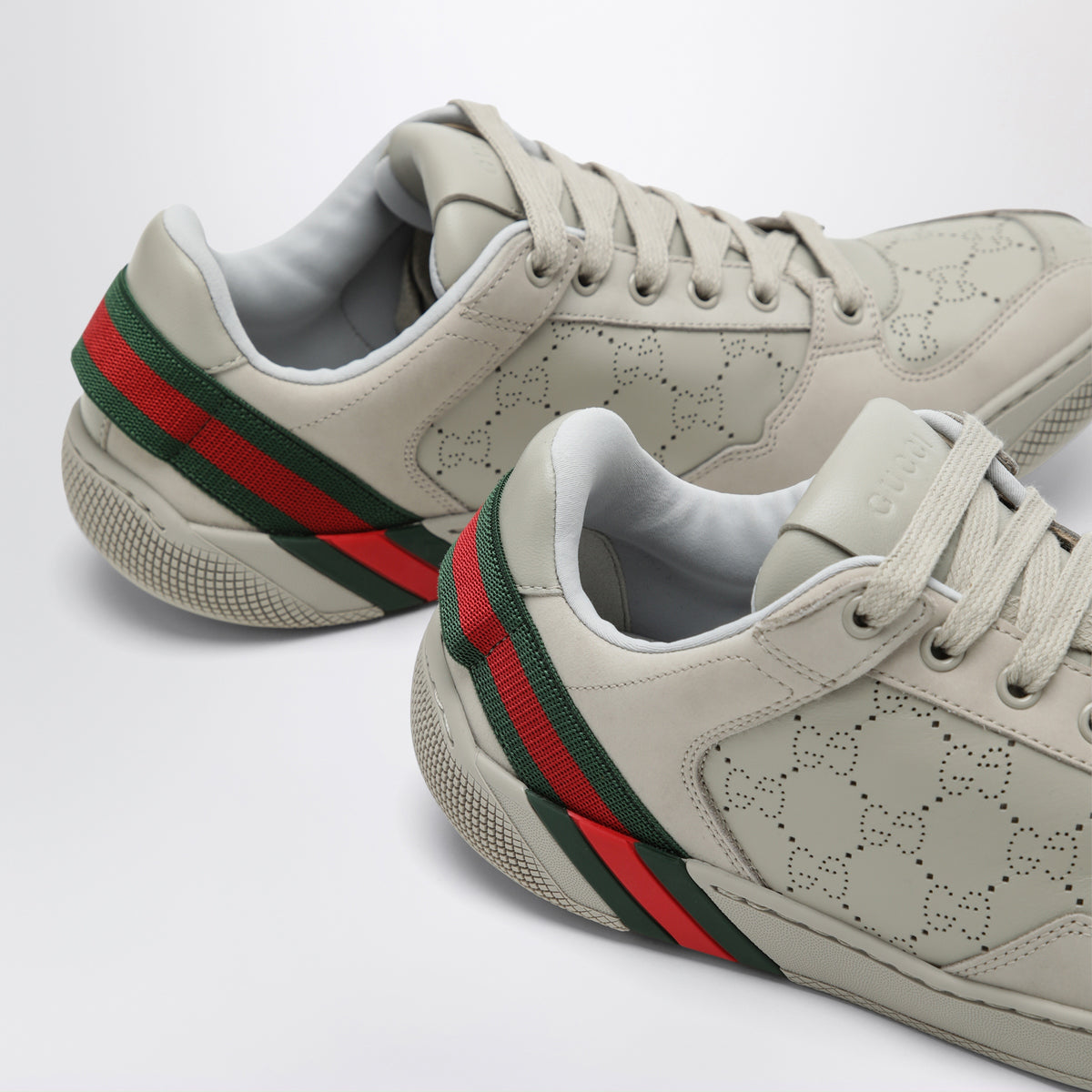 Grey sneakers with perforated GG motif