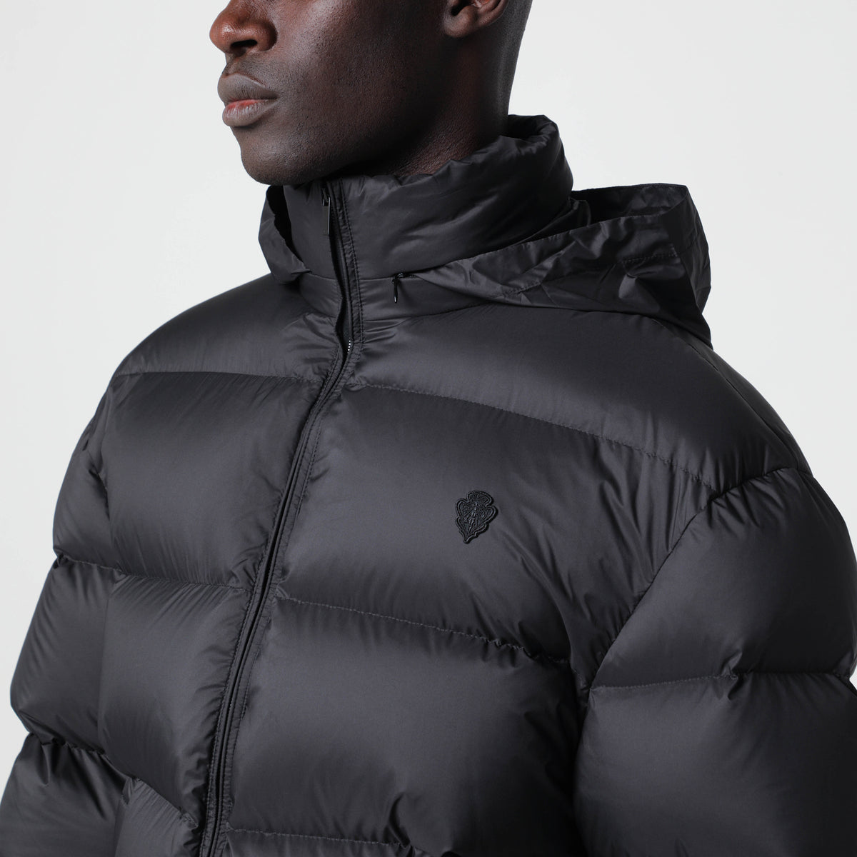 Piumino imbottito con zip nero