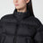 Piumino imbottito cropped con zip nero