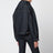 Giacca blu indaco in denim con ampio scollo