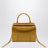 Borsa Amazona 180 media color ocra in pelle scamosciata