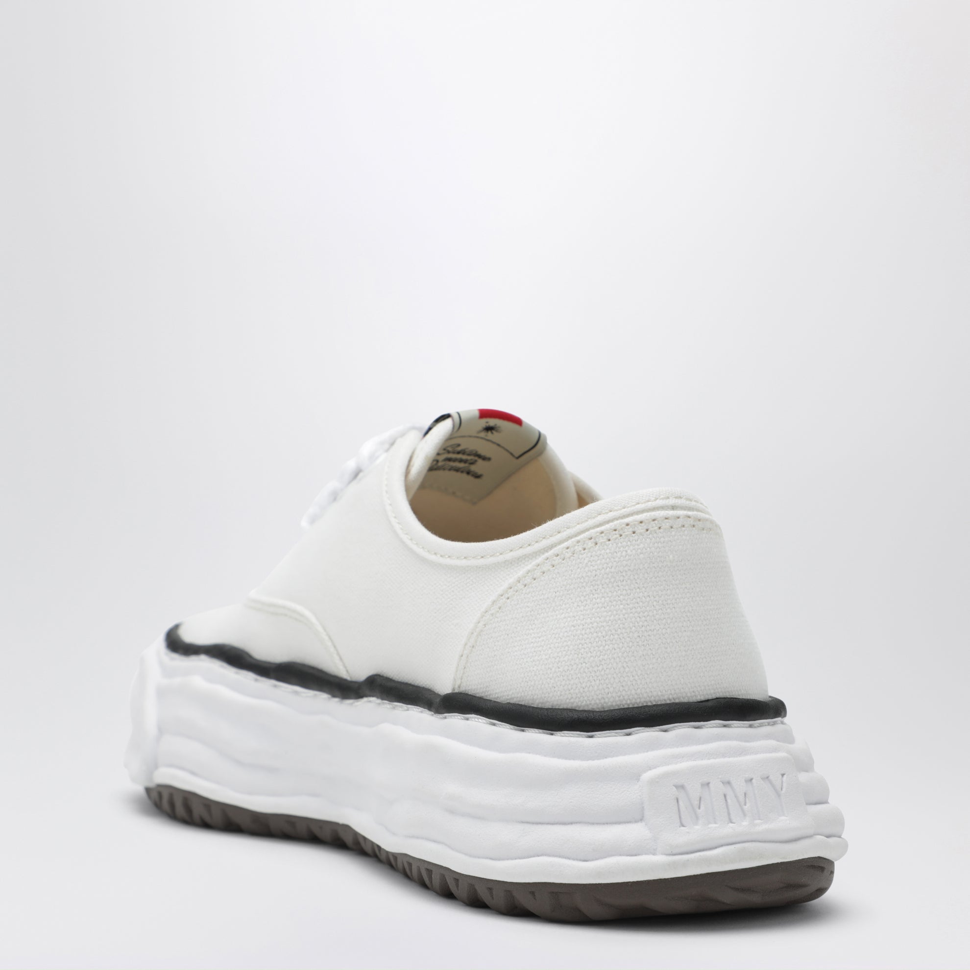 Sneakers Baker in tela bianche