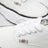 Sneakers Baker in tela bianche