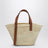 Basket bag in palm leaf and leather