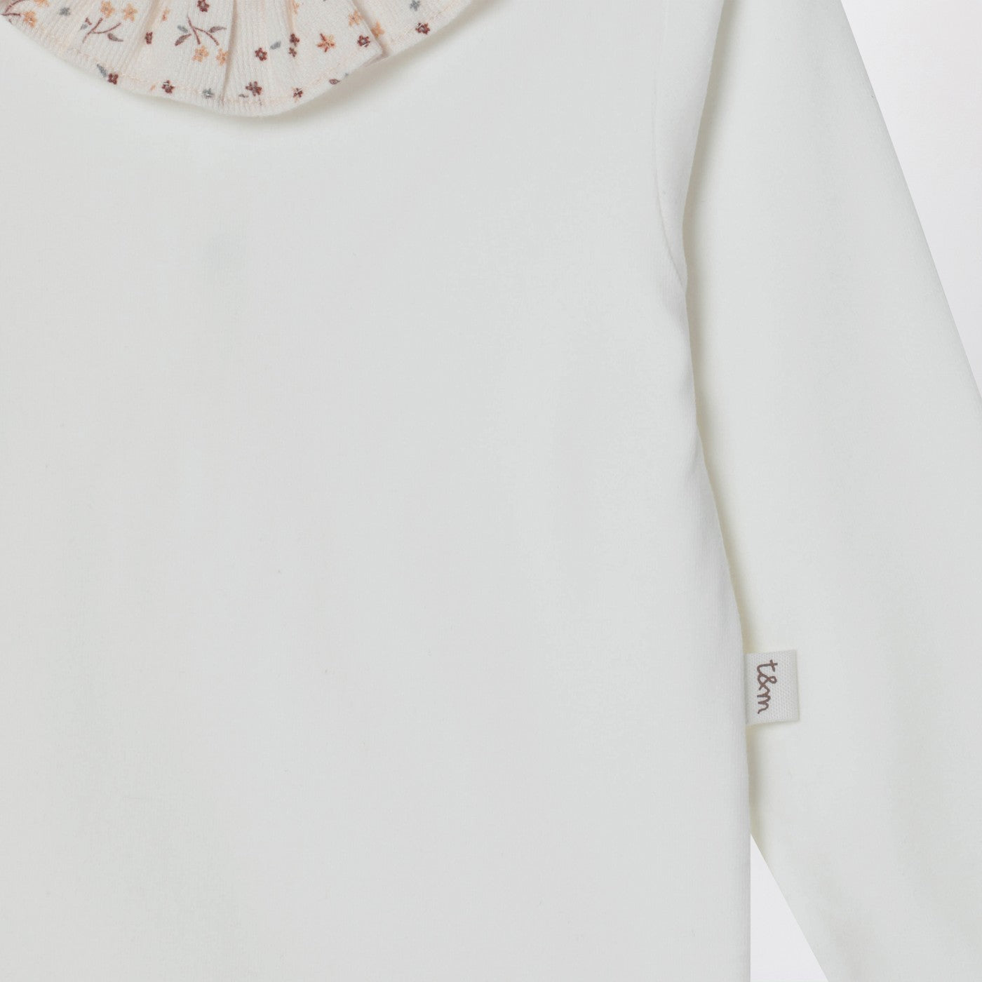 White bodysuit with neckline and floral print