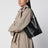 Black S shoulder bag in cow leather